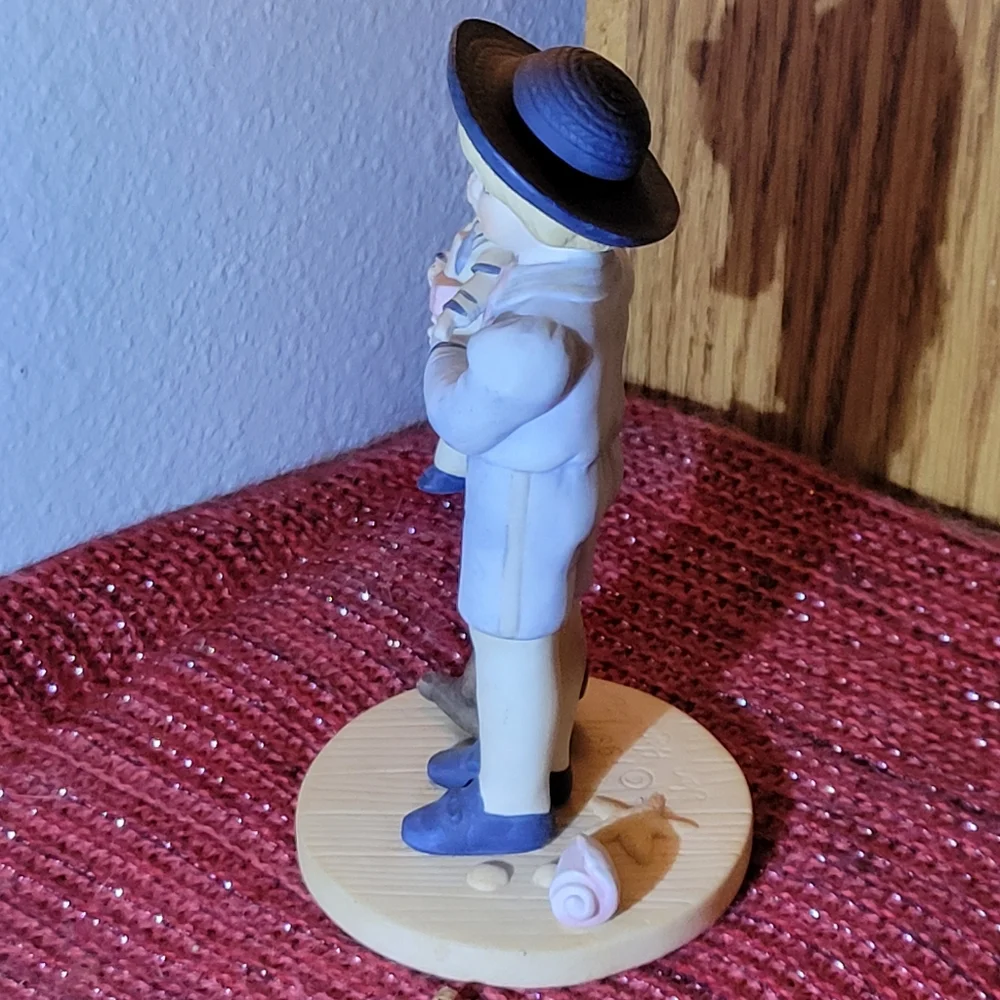 VINTAGE PORCELAIN BOY WITH DOLL FIGURINE 